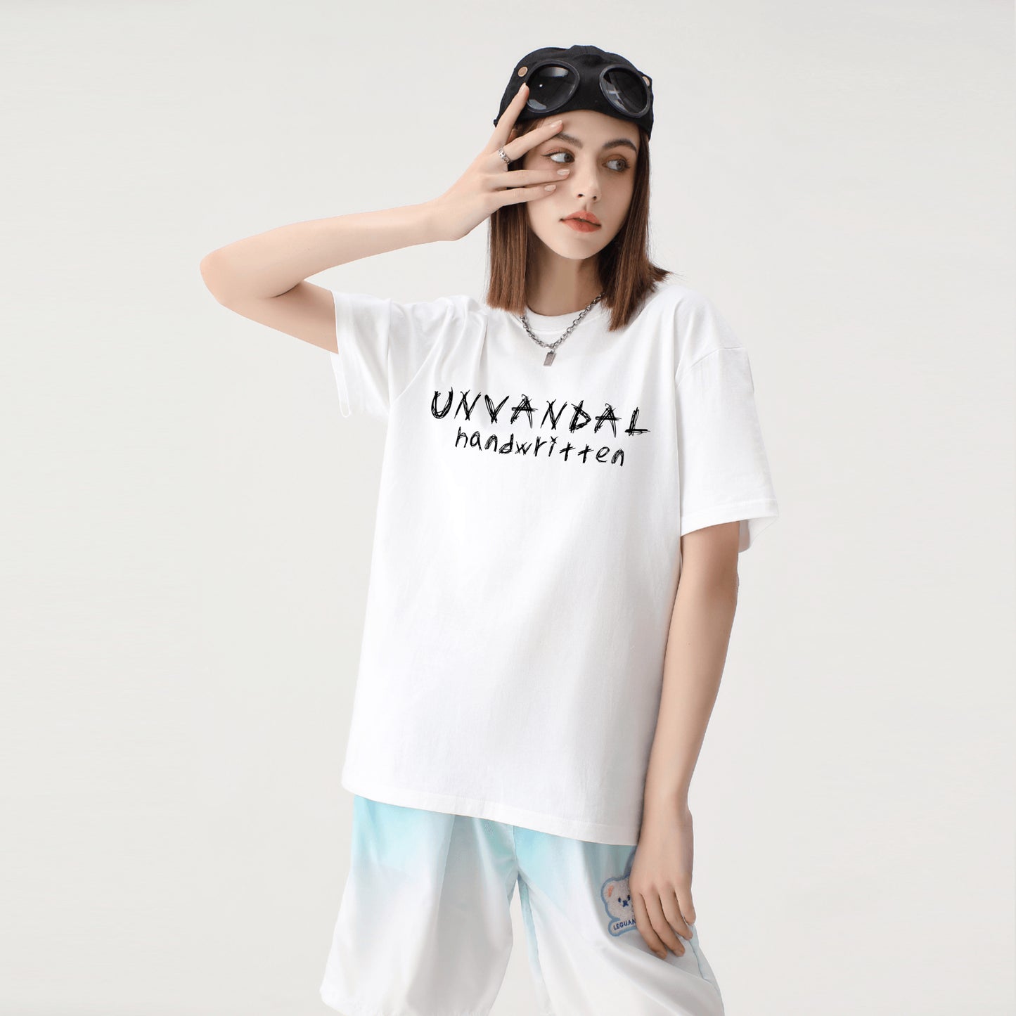 Unvandal handwritten black lettering baggy shirt